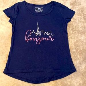 Girls size small navy blue short sleeve shirt. It says bonjour across the front.